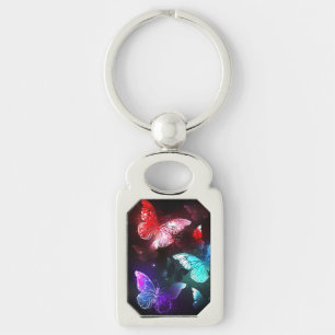 Three Glowing Butterflies on night background Keychain