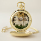 Three Golden Retriever puppies pocket watch