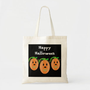Three Grinning Pumpkins Tote Bag