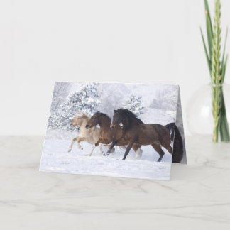 Three Horses Run in the Snow Greeting Card
