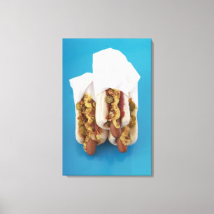 Three hot dogs in buns canvas print