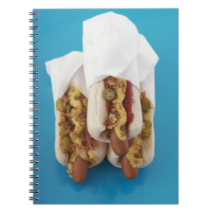 Three hot dogs in buns notebook
