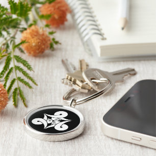 Three looped wild geese, inward-facing keychain