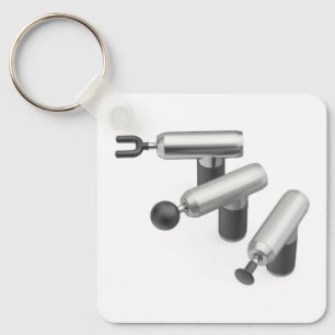 Three massage guns with different massage heads keychain