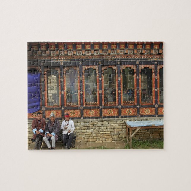 Three men sit on a bench at the Memorial Chorten Jigsaw Puzzle (Horizontal)