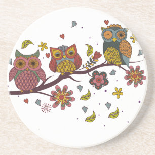 Three owls on branch coaster
