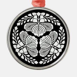 Three paulownia blooms, heads facing outward metal ornament