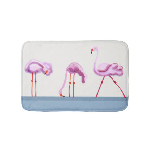Three pink flamingos bath mat