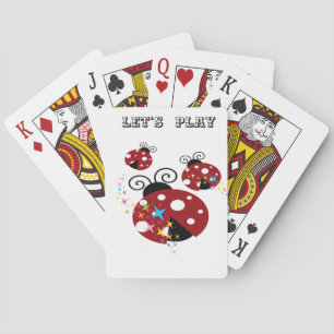Three red and black ladybug with stars playing cards