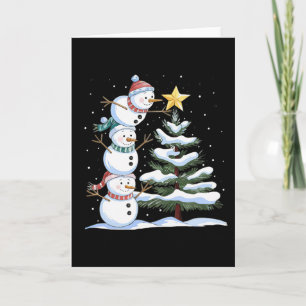 Three Snowmen Are Arranging A Christmas Tree Cute Card