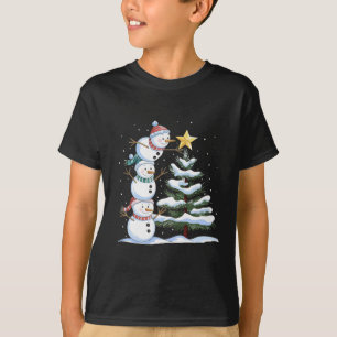 Three Snowmen Are Arranging A Christmas Tree Cute  T-Shirt
