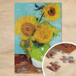 Three Sunflowers | Vincent van Gogh Jigsaw Puzzle<br><div class="desc">Three Sunflowers (1888) by Vincent van Gogh is a vibrant still life that showcases the artist’s signature thick brushstrokes and bold use of color. The painting features three sunflowers in a simple vase, their golden petals contrasting against the aqua blue background. Van Gogh's vivid yellow palette brings energy and life...</div>