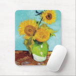 Three Sunflowers | Vincent van Gogh Mouse Pad<br><div class="desc">Three Sunflowers (1888) by Vincent van Gogh is a vibrant still life that showcases the artist’s signature thick brushstrokes and bold use of color. The painting features three sunflowers in a simple vase, their golden petals contrasting against the aqua blue background. Van Gogh's vivid yellow palette brings energy and life...</div>