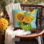Three Sunflowers | Vincent van Gogh Outdoor Pillow<br><div class="desc">Three Sunflowers (1888) by Vincent van Gogh is a vibrant still life that showcases the artist’s signature thick brushstrokes and bold use of colour. The painting features three sunflowers in a simple vase, their golden petals contrasting against the aqua blue background. Van Gogh's vivid yellow palette brings energy and life...</div>