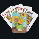 Three Sunflowers | Vincent van Gogh Playing Cards<br><div class="desc">Three Sunflowers (1888) by Vincent van Gogh is a vibrant still life that showcases the artist’s signature thick brushstrokes and bold use of colour. The painting features three sunflowers in a simple vase, their golden petals contrasting against the aqua blue background. Van Gogh's vivid yellow palette brings energy and life...</div>