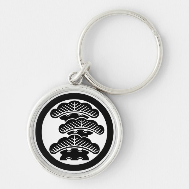 Three-tiered pine R in circle Keychain (Front)