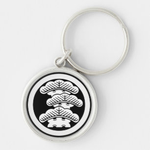 Three-tiered pine R in circle Keychain