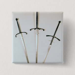 Three two-handed swords, 1570 2 inch square button