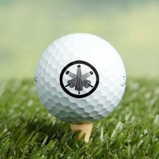 Three umbrellas, staggered in circle golf balls
