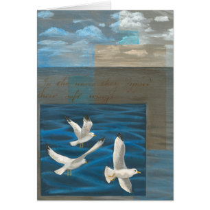 Three White Seagulls Flying Over the Water
