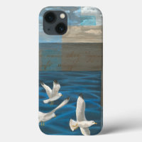 Three White Seagulls Flying Over the Water