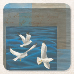 Three White Seagulls Flying Over the Water Square Paper Coaster