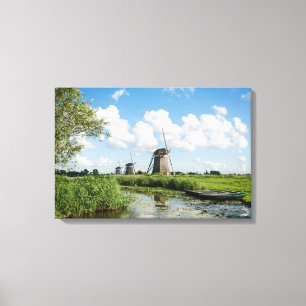 Three windmills and a canal canvas