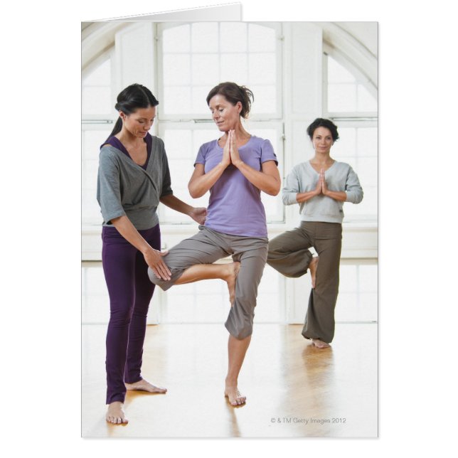 Three women practicing yoga (Front)