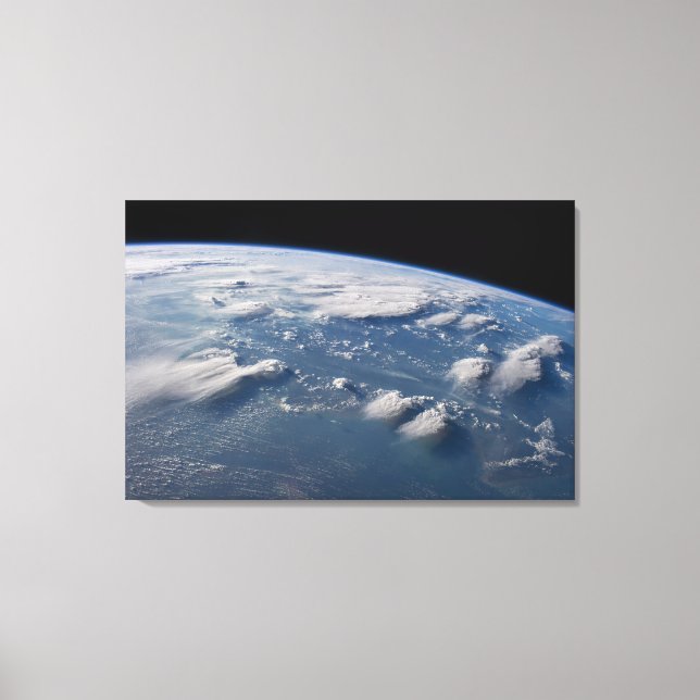 Thunderhead Anvils Of Earth Onto Southern Borneo. Canvas Print (Front)