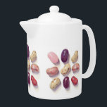 TIC TAC TOE JELLY BEANS Teapot<br><div class="desc">The image on this TIC TAC TOE JELLY BEANS porcelain teapot is a group of multi-coloured and flavoued jelly beans, arranged in a tic tac toe pattern. They were all drawn by hand with coloured pencils. The art repeats around the teapot. * Matching products are available in the JELLY BEANS...</div>