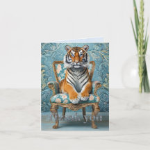 Tiger sitting on a vintage chair 