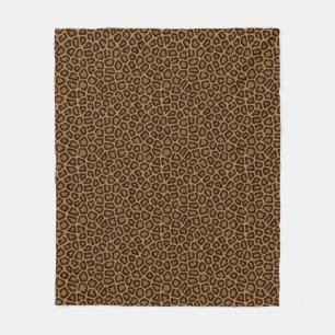 Tile background with a leopard fur fleece blanket