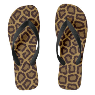 Tile background with a leopard fur flip flops
