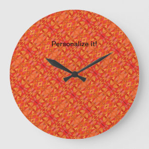 Tiled and mirrored organic shapes in hot colours large clock