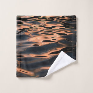 Time lapse photography of rippling water wash cloth