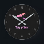 Time of Bats - Pink & Purple Abstract Pop Art Round Clock<br><div class="desc">Retro,  pop,  colourful creation of bats,  Round Clock.
Special theme of Pink & Purple colouring,  with simple but elegant icon styled art.
Original digital art by Raphael Studio - 'Bat'.
Retro pop style,  unique design.</div>