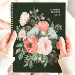 Timeless Dark Floral Custom Name Planner<br><div class="desc">This elegant design features a lush bouquet of florals in coral, blush, cream, and soft green tones, set against a rich dark green background. The personalized name and year add a refined and classic touch, perfect for professionals, students, or anyone who appreciates timeless floral artistry. Ideal for organizing daily tasks,...</div>