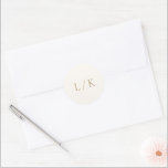 Timeless Monogram Ivory and Gold Elegant Wedding Classic Round Sticker<br><div class="desc">Elegant wedding stickers featuring a classic style with your monogram in a traditional serif font.   This simple design goes well with any style of wedding.</div>