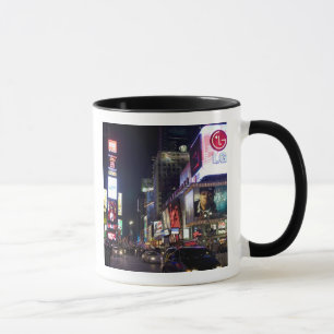 Times Square at night in Manhattan, New York Mug