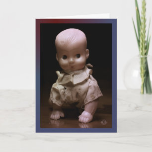 Timmy, the creepy Halloween doll, crawls forth. Card