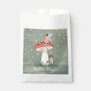Tiny fairy perched on top of mushroom and glowing favour bag