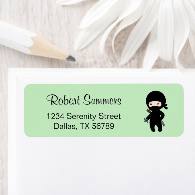 Tiny Ninja Holding Throwing Star on Green (Insitu)