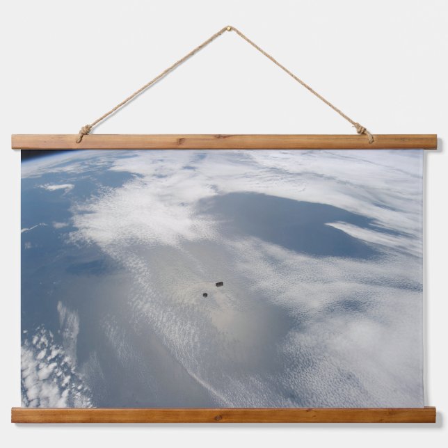 Tiny Satellites Orbit Above A Part Of Earth. Hanging Tapestry (Front)