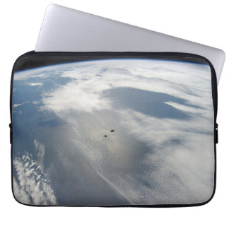 Tiny Satellites Orbit Above A Part Of Earth. Laptop Sleeve