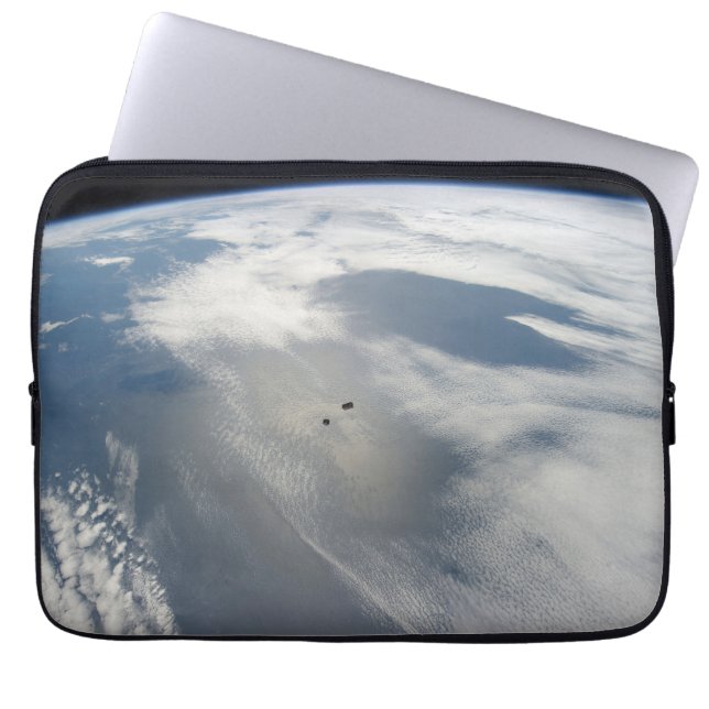 Tiny Satellites Orbit Above A Part Of Earth. Laptop Sleeve (Front)