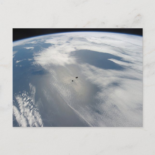 Tiny Satellites Orbit Above A Part Of Earth. Postcard (Front)
