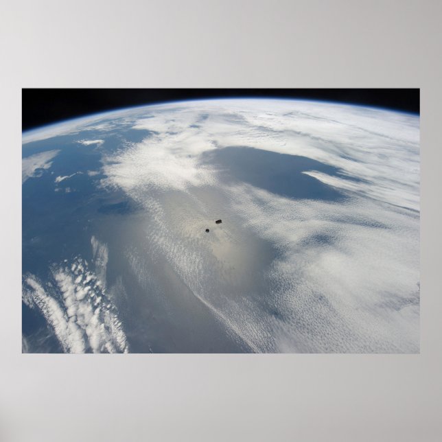 Tiny Satellites Orbit Above A Part Of Earth. Poster (Front)