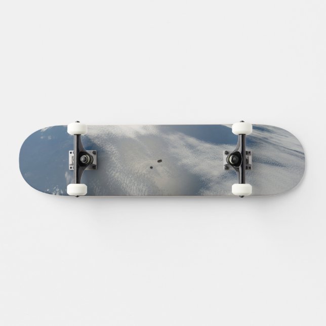 Tiny Satellites Orbit Above A Part Of Earth. Skateboard (Horz)