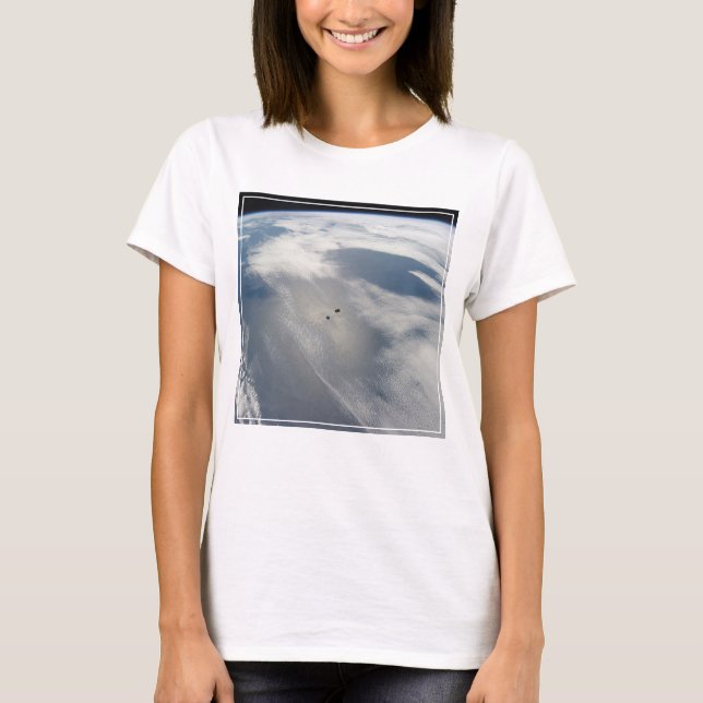 Tiny Satellites Orbit Above A Part Of Earth. T-Shirt (Front)