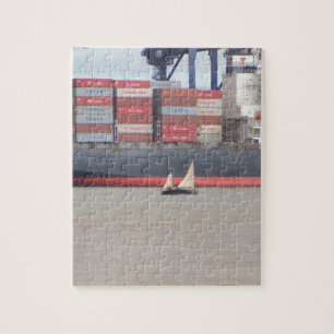 Tiny Yacht  And Huge Container Ship Jigsaw Puzzle